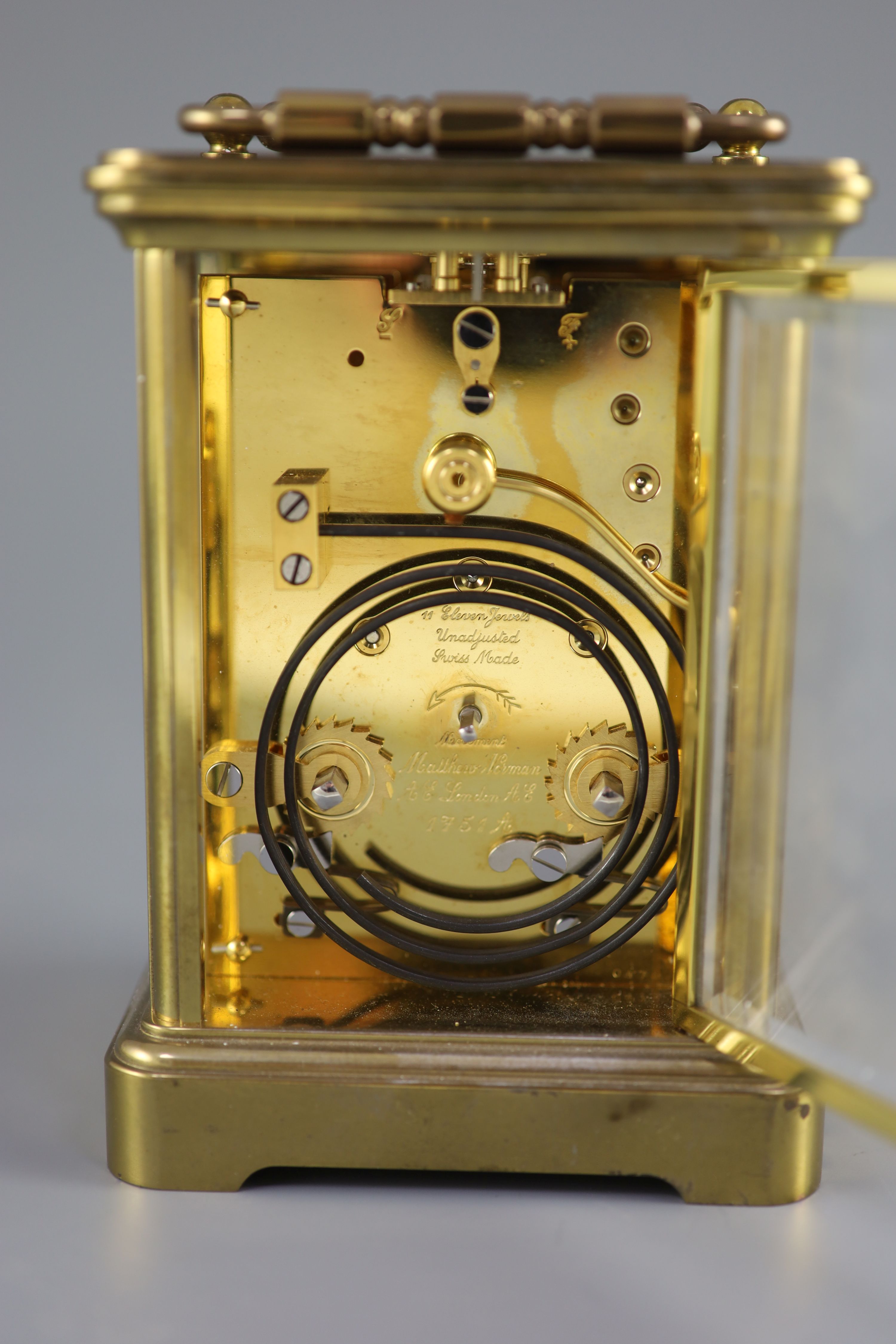 A large Swiss-made brass carriage clock, Matthew Norman, London, 20th century 14cm high.